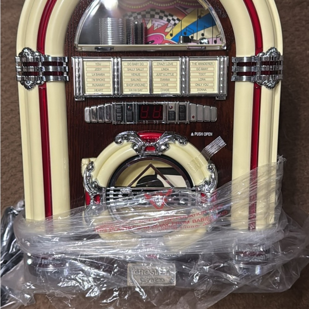 Crosley Vintage Jukebox with Red and Cream Accents